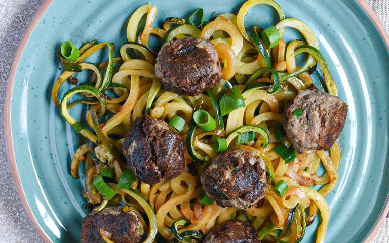 Photo of Ginger Sardine Balls Over Asian Zucchini Noodles