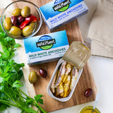 Open can of Wild White Anchovies In Water