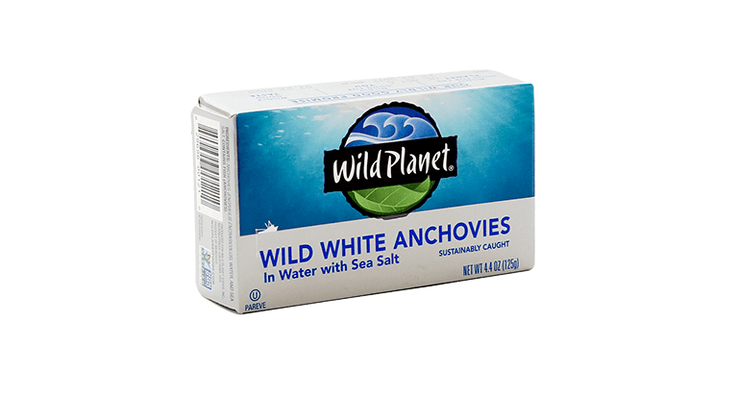 package of wild white anchovies in water